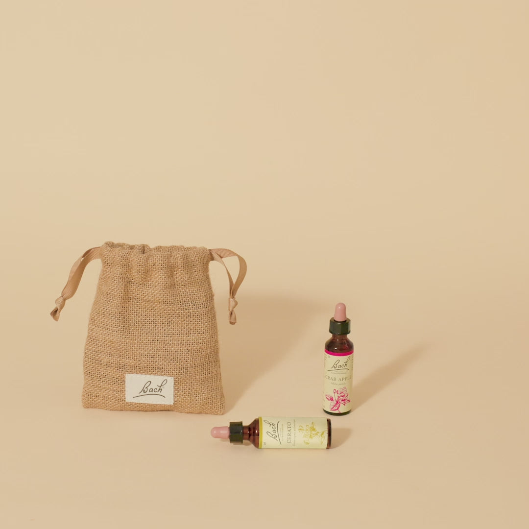 Video of a hand taking out the Bach™ Original Flower Remedy Larch dropper from the bach bag and placing it next to the Bach™ Original Flower Remedy Crab Apple dropper and Bach™ Original Flower Remedy Cerato dropper which is lying down.