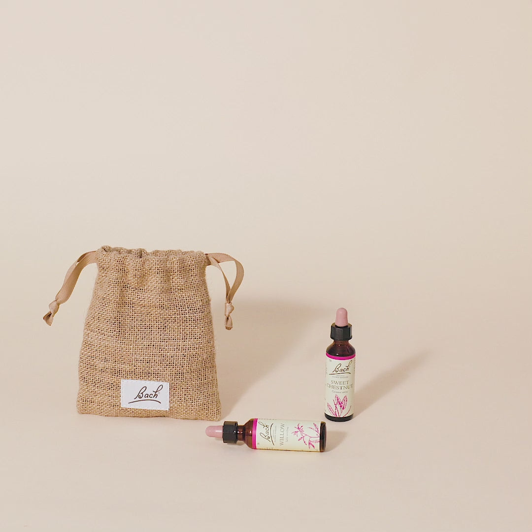 Video of a hand taking out the Bach™ Original Flower Remedy Star of Bethlehem dropper from the bach bag and placing it next to the Bach™ Original Flower Remedy Sweet Chestnut dropper and Bach™ Original Flower Remedy Willow dropper which is lying down.