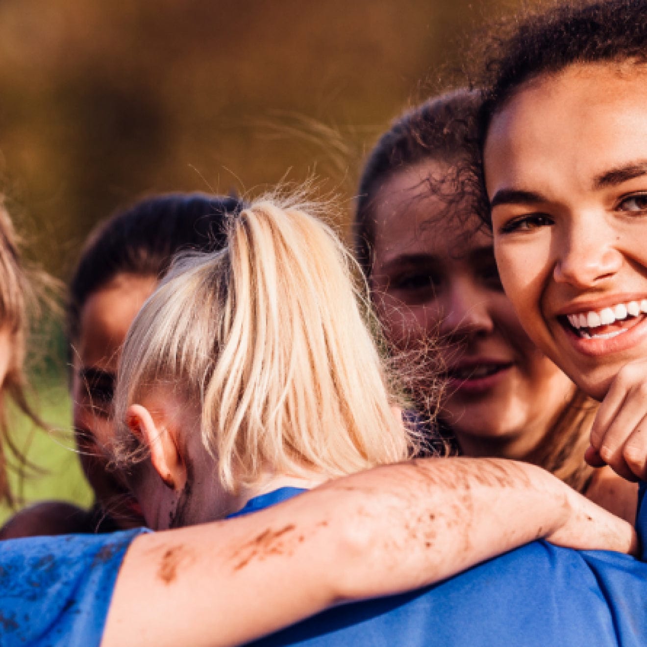 Group of women playing sport, ruby, football