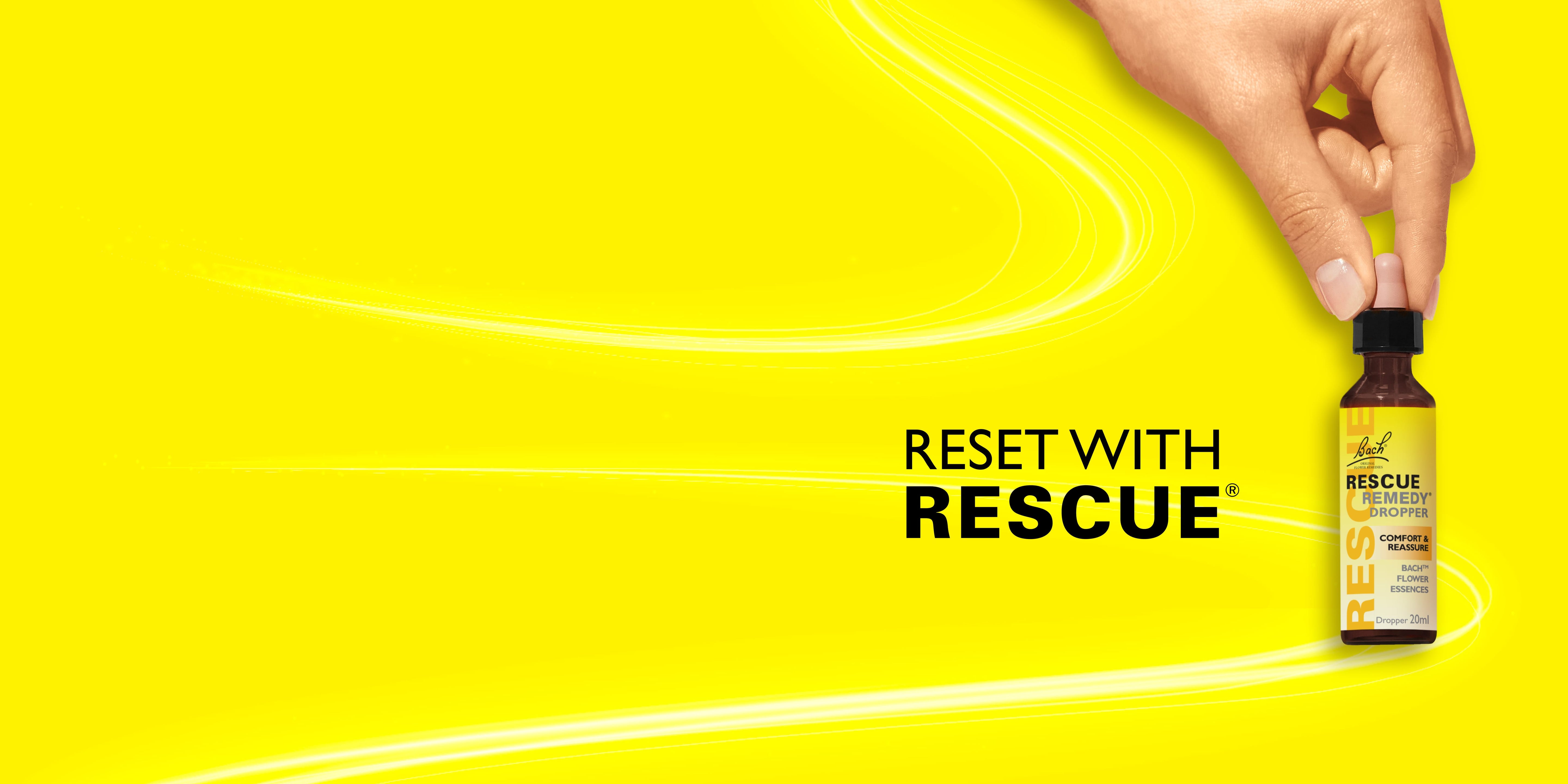 Hand holding a bottle labeled 'Rescue' against a bright yellow background with text 'Reset with Rescue'.
