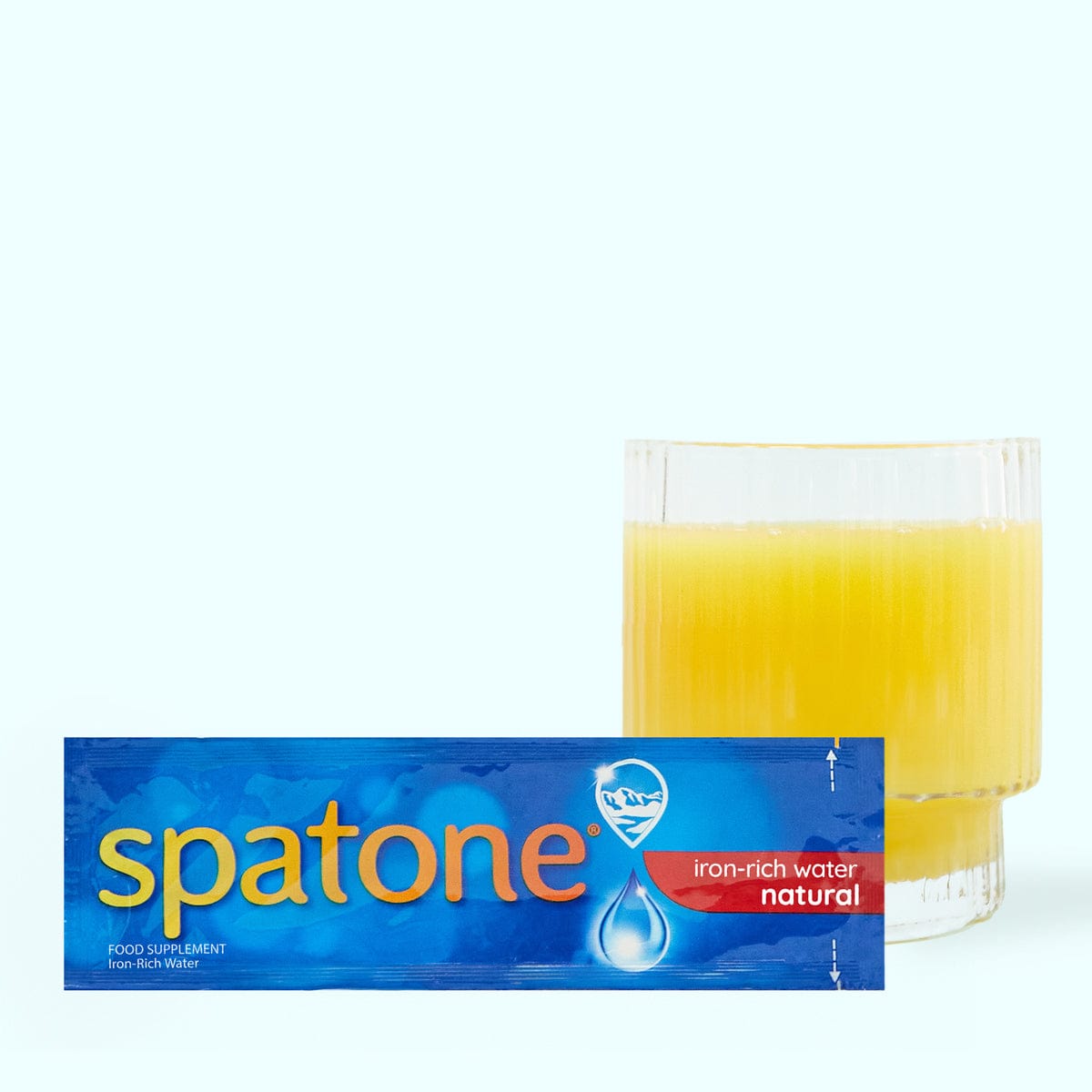 Spatone® Original sachet with orange juice glass