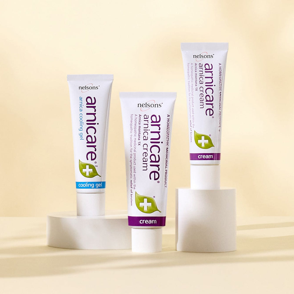 Homeopathic remedies with Arnica Montana plant, Nelsons Arnicare® Cream for bruise relief and Arnicare® Cooling Gel with menthol for muscle soreness
