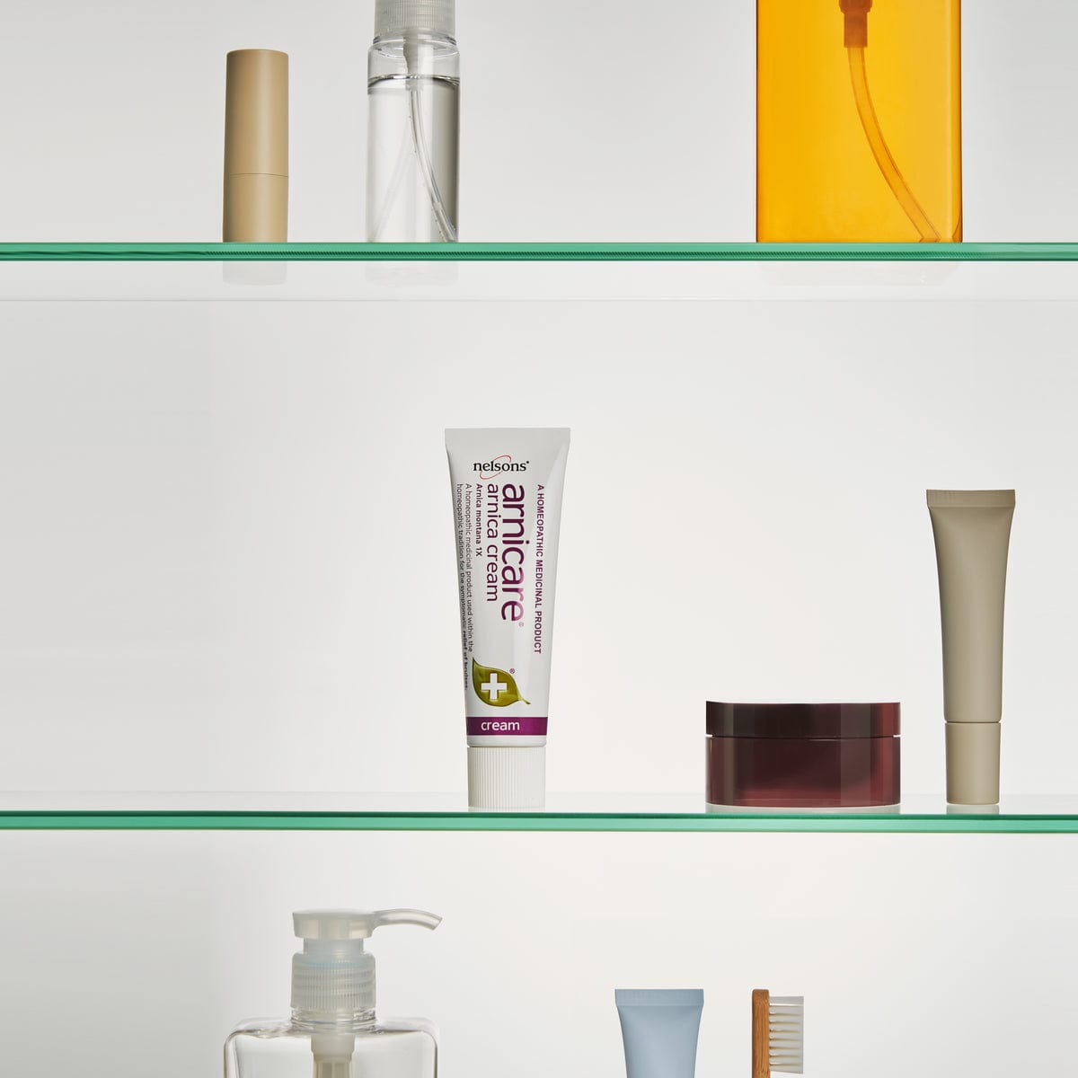 Nelsons Arnicare® arnica cream, a homeopathic medicinal product, on bathroom shelf