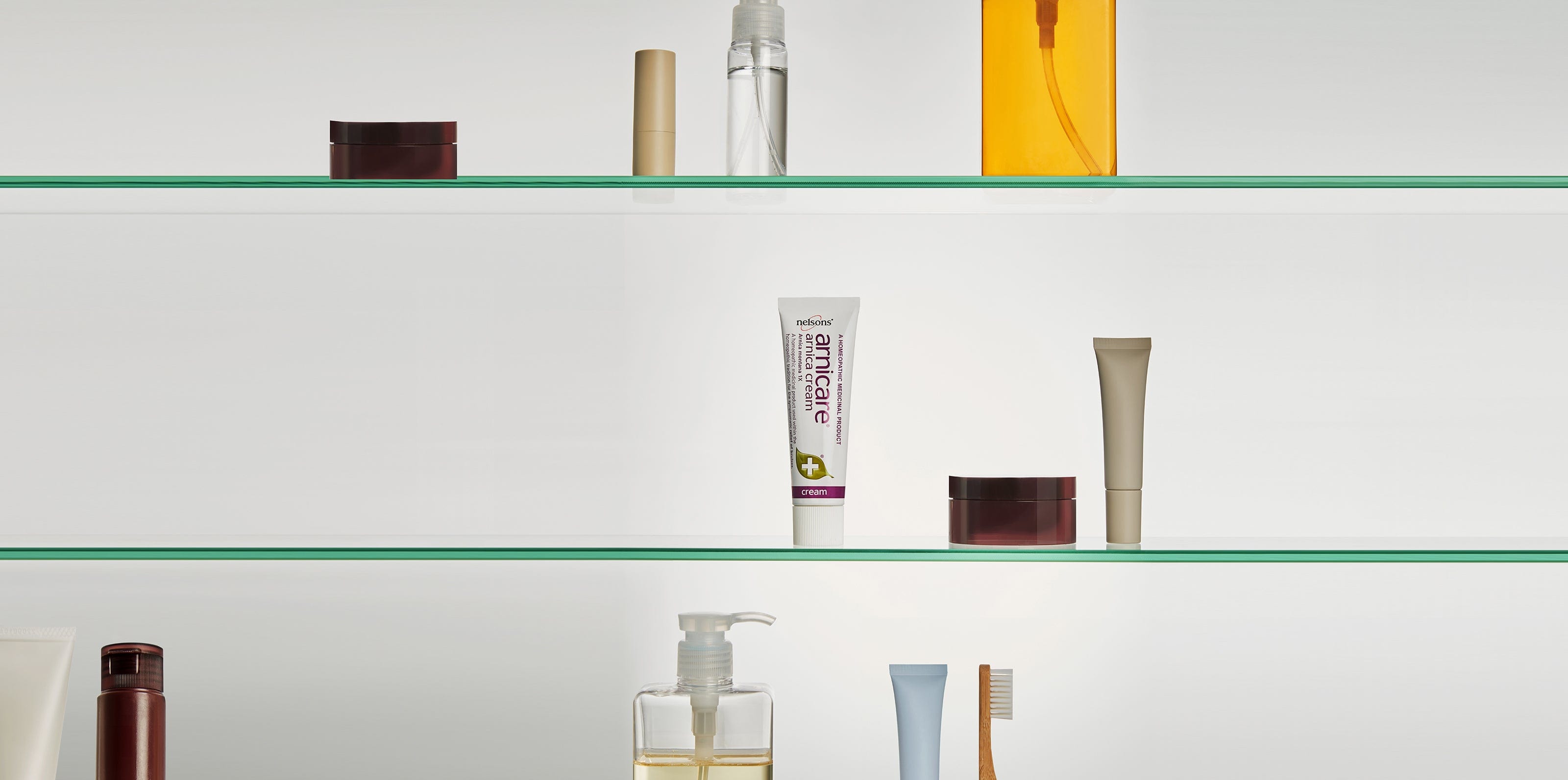 Nelsons Arnicare® arnica cream, a homeopathic medicinal product, on bathroom shelf