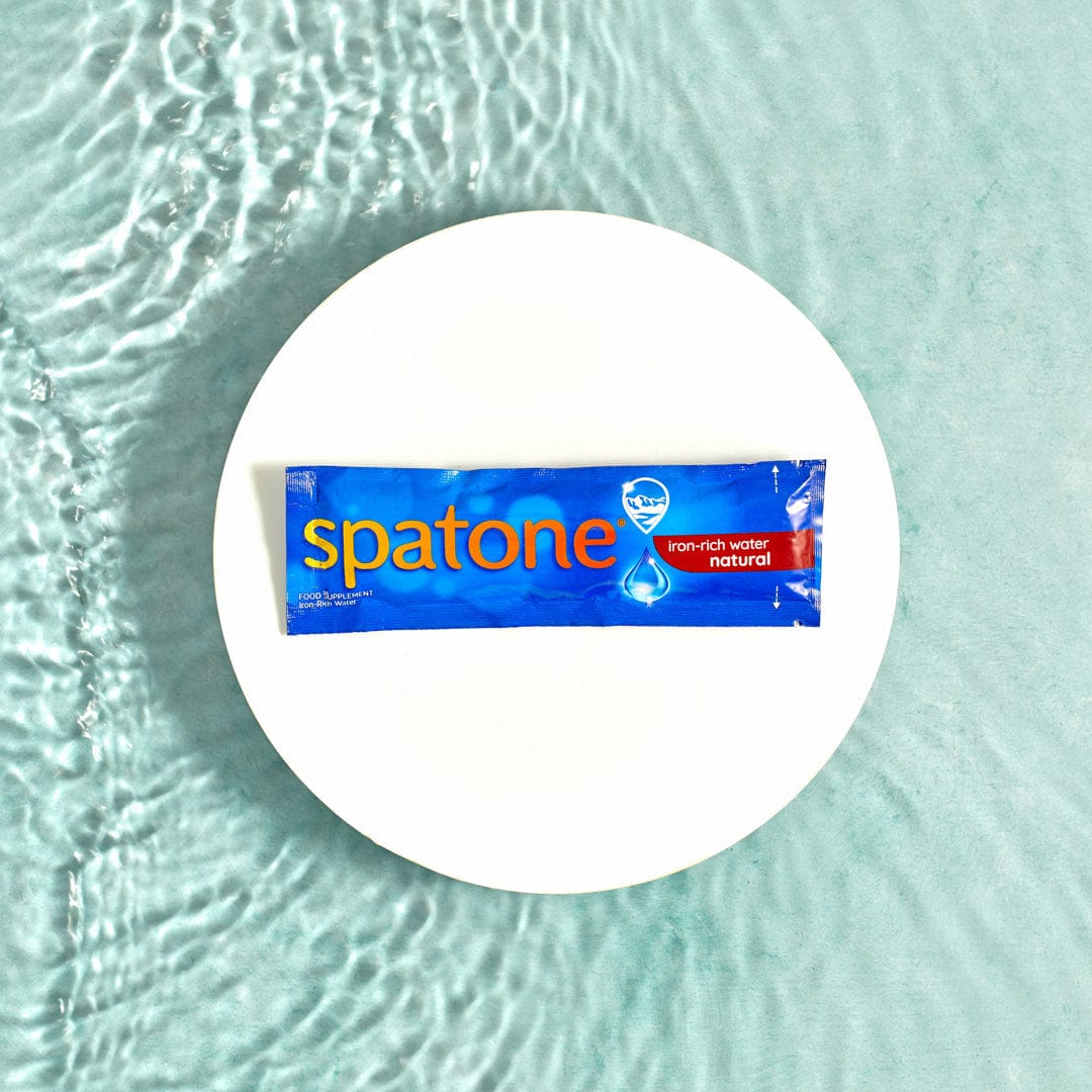 Spatone® Iron-rich water on a plate in water